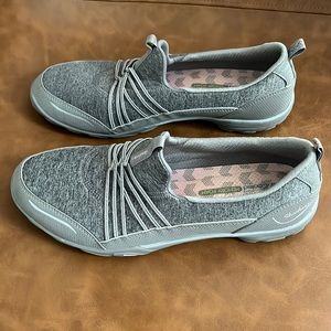 Women’s size 10 grey slip on Skechers.